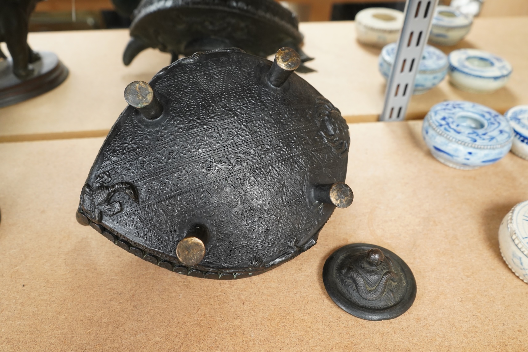 A Chinese cast bronze 'tortoise’ ritual tea kettle, 30cm long